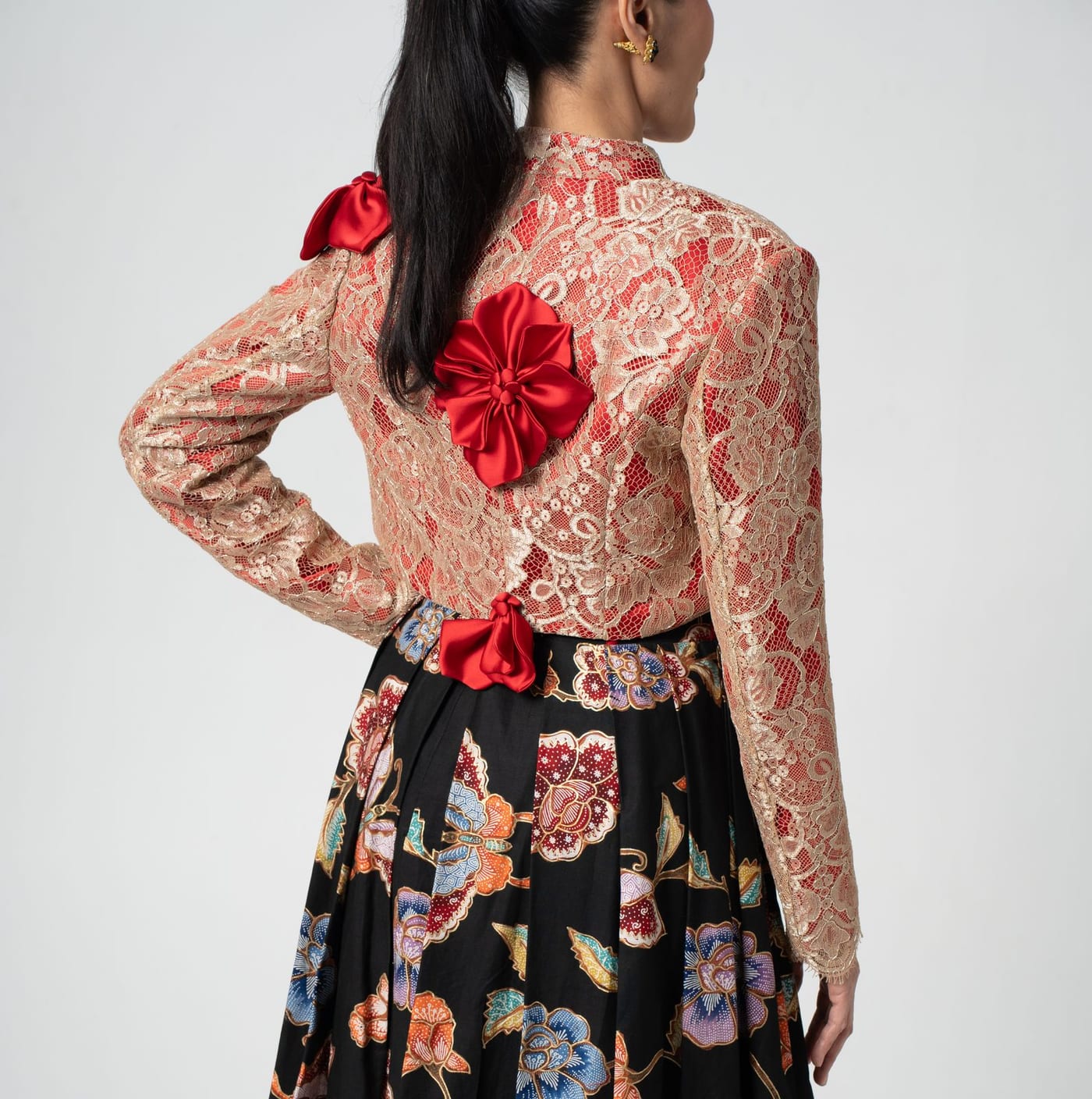 Gilded Lace, gilded lace and a single red bloom over batik florals