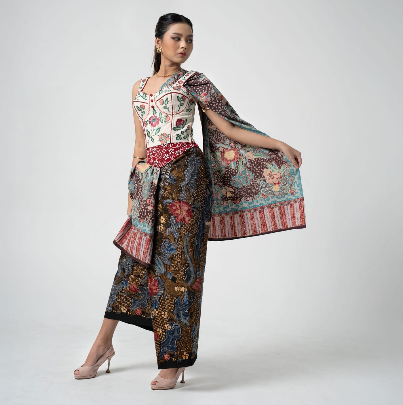 Pesisir Patchwork, embroidered blooms over a patchwork of coastal batik