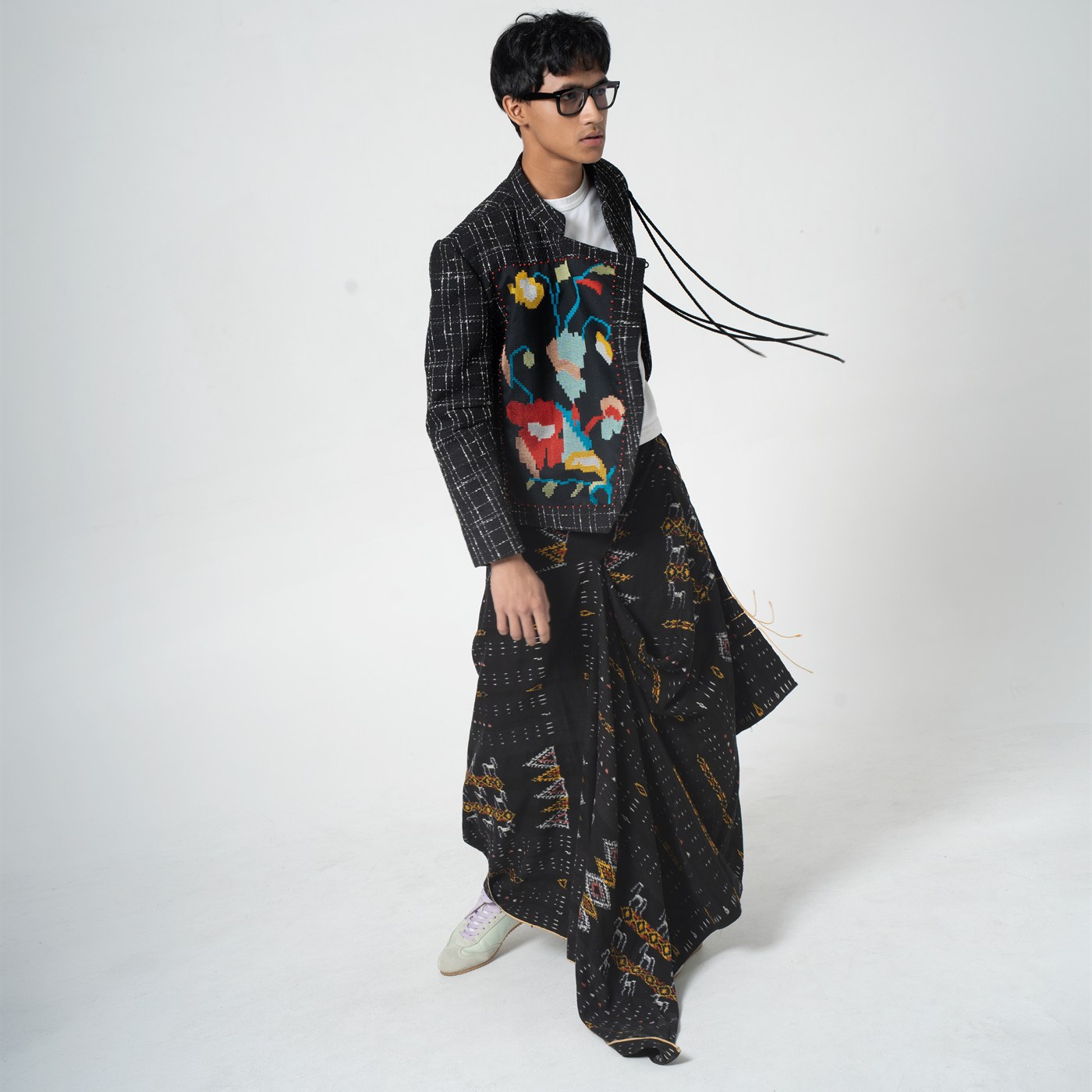 Menswear, Ikat, cross-stitch tapestry on plaid over a Sumba-ikat sarong